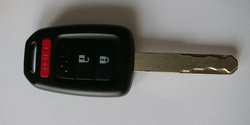 Honda integrated smart key with rectangle buttons. Used in mid 2010's Honda Accord Sedans & other Honda Models.