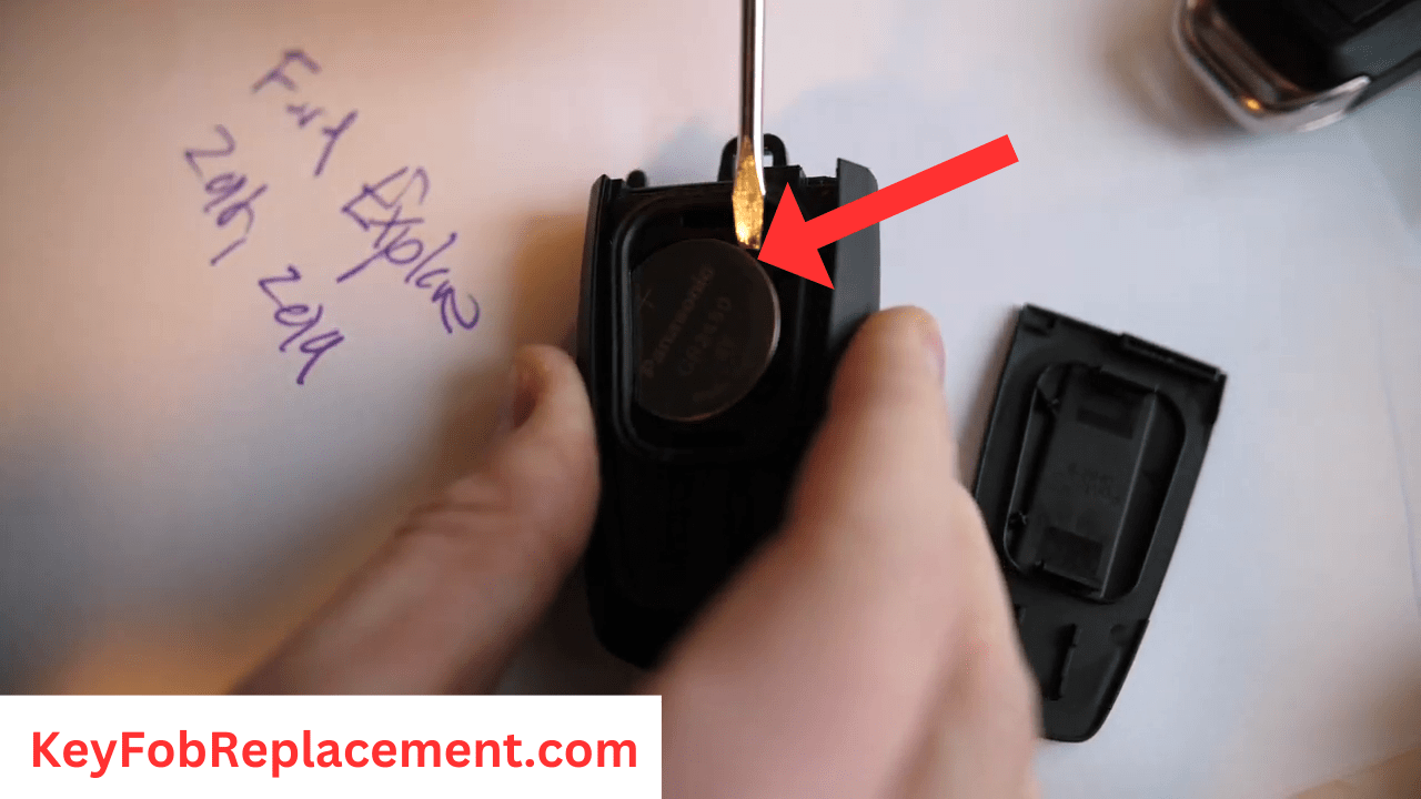 Ford Explorer 2018 to 2019 Use a screwdriver to remove battery