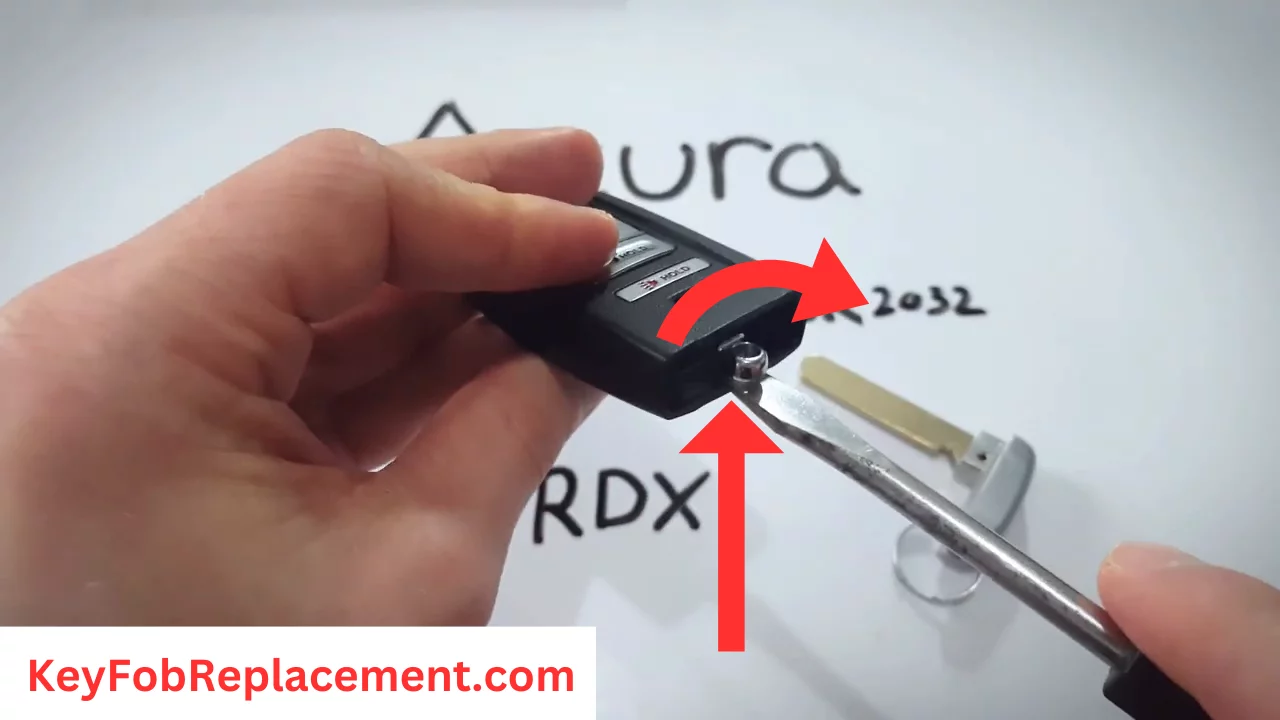 Use screwdriver to separate Acura RDX Smart 4-Button key fob