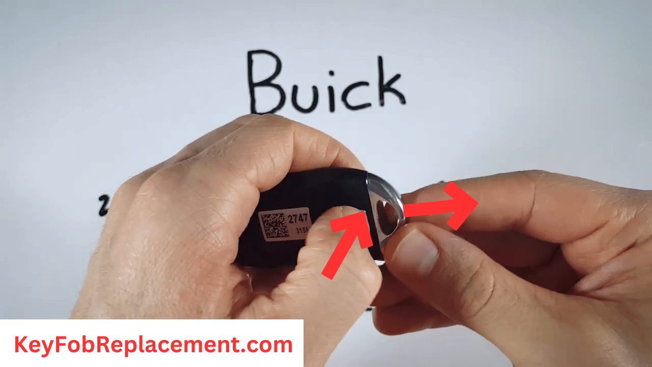 Buick Encore Flip key, press silver button, pull valet key