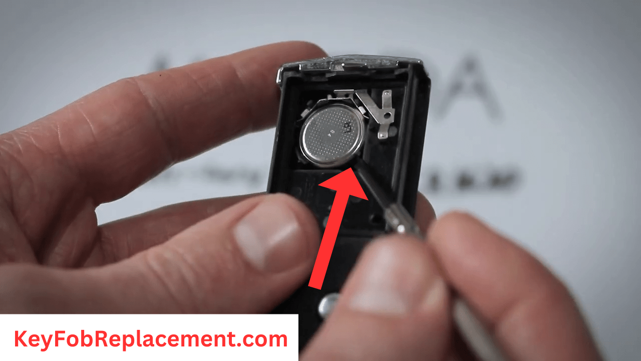 Mazda 2 Flip Key Pry out battery using tool